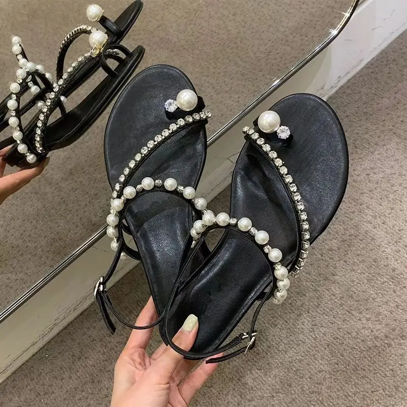 

2026 Summer New Women's One-Strap Fairy Style Sandals Trendy Rhinestone Pearl Elegant Flip-Flop Flat Roman