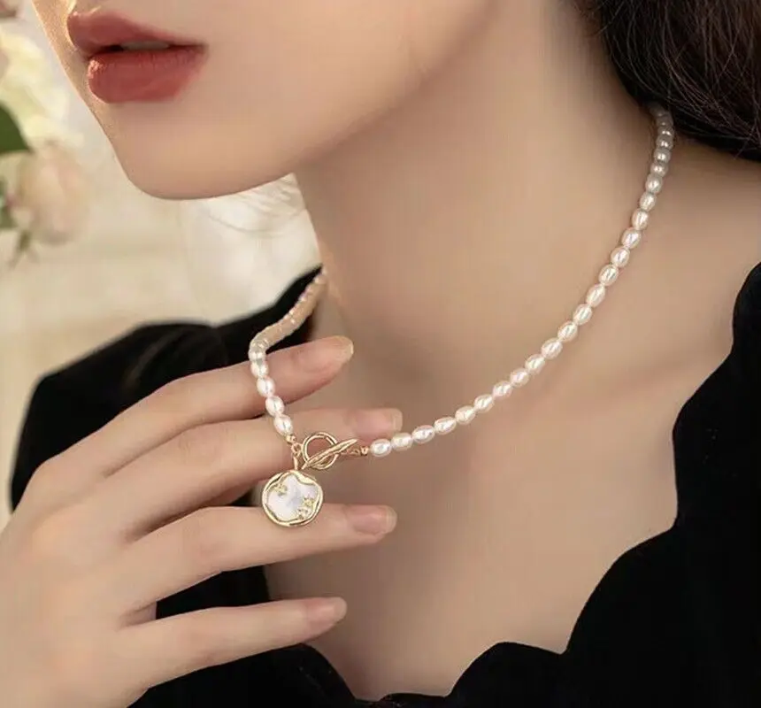 

Natural 6-7mm White Freshwater Rice Pearl 18KGP Flower Pendant Necklace 18"