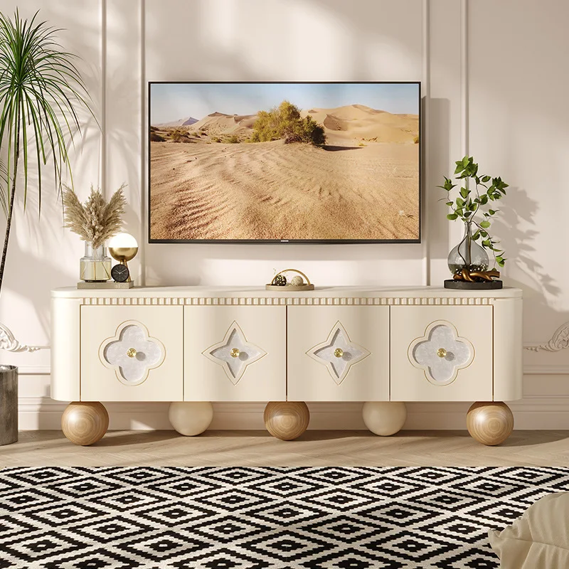 

French light luxury TV cabinet high-end living room home four-leaf clover designer cream wind solid wood floor cabinet