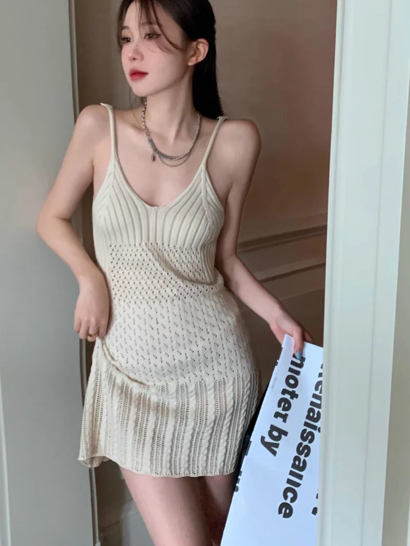 

Knitted camisole dress for women's summer fresh and spicy girl temperament skirt design sense slim hip wrap short skirt X9E1