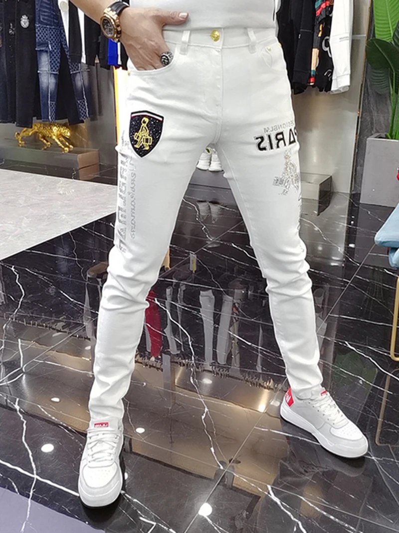 

Мужские джинсы Slim Fit: модные, брендовые, весенне-осенние, с термотрансферным принтом «Белый бриллиант», европейский стиль, повседневные длинные брюки для молодежи