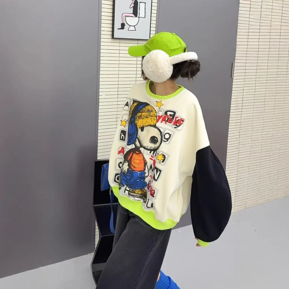 Gesplitste contrasterende trui Dames lente nieuwe schoudermouwen Leeftijdverminderende cartoon losse top met ronde hals