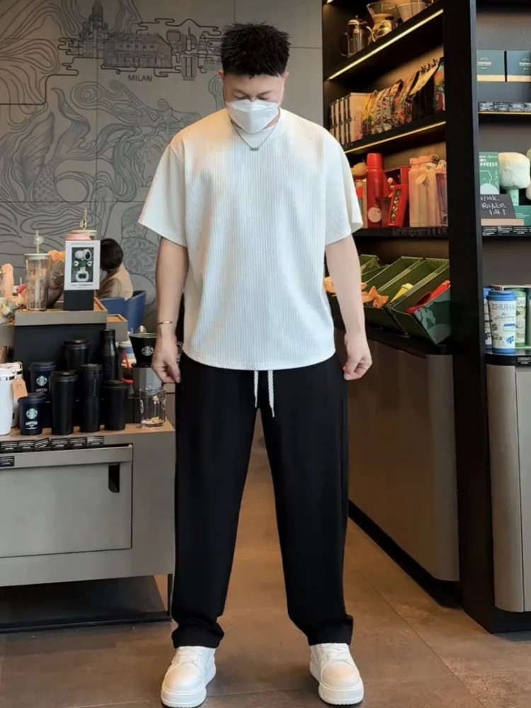 

Летний мужской легкий дышащий спортивный костюм из ледяного шелка с драпировкой, модный комплект из двух предметов: футболка с коротким рукавом и прямые брюки