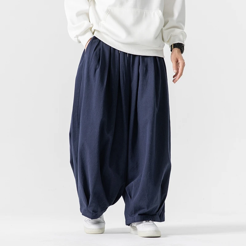 Pantaloni a gamba larga da uomo oversize pantaloni da jogging elastici in vita pantaloni da uomo Casual Harem pantaloni larghi da uomo di moda di grandi dimensioni 5XL