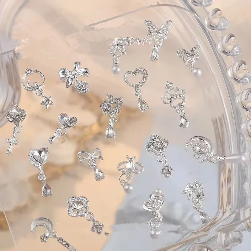 

10pcs New Nail Art Alloy Diamond Jewelry Charms Luxury Accessories Silver Series Tassel Bow Crown Moon Jewelry For Manicure Deco