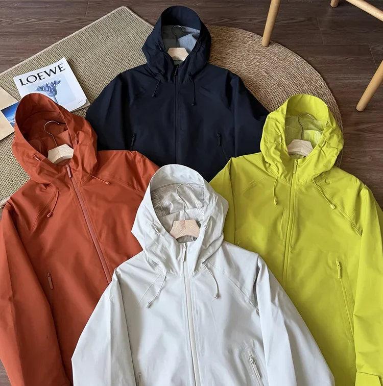 Unisex Windbreaker-Jacke mit Kapuze in Unifarbe – Leichte Reißverschluss-Oberbekleidung für Herbstfahrten und Outdoor-Aktivitäten – Detail 5