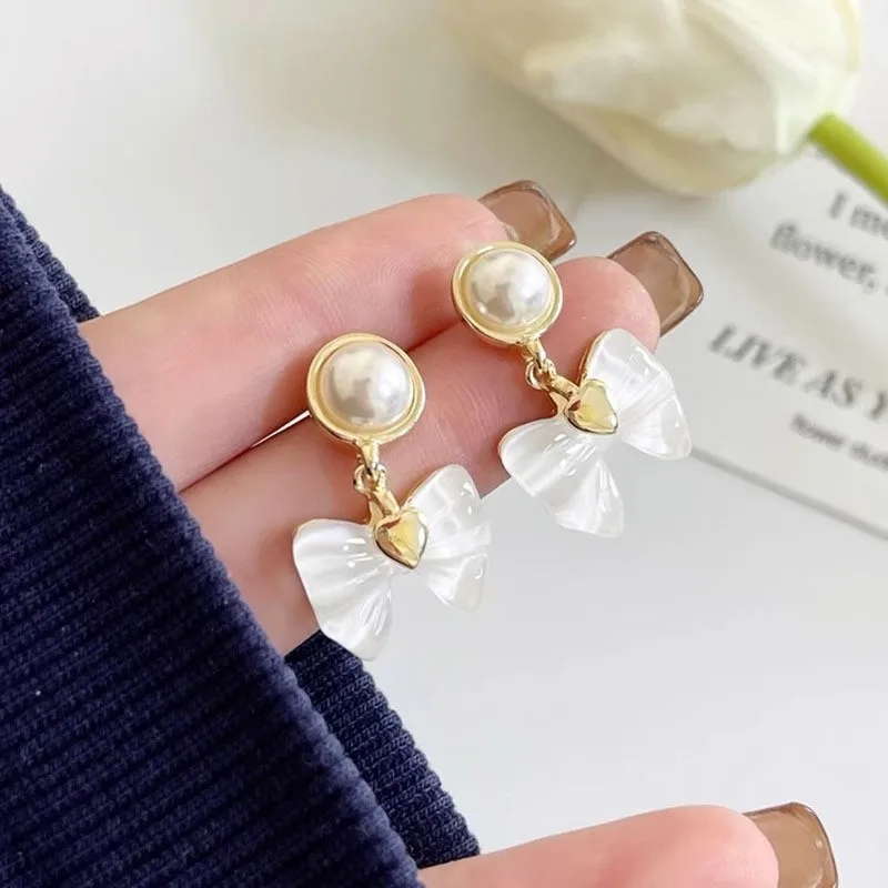 925 Silver Needle Korean Fashion Pearl Bowknot Earrings For Women Jewelry 2026 Trending New Women's White Bow Drop Earrings