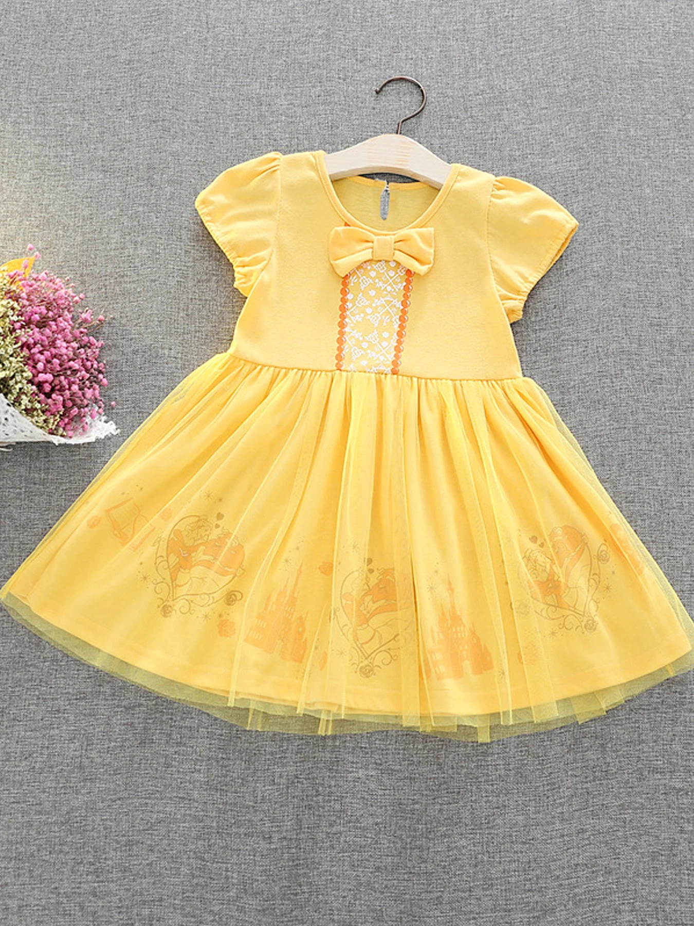 Vibrant yellow princess dress - short sleeves, cute bow decoration, button closure, perfect for girls party occasions and summer