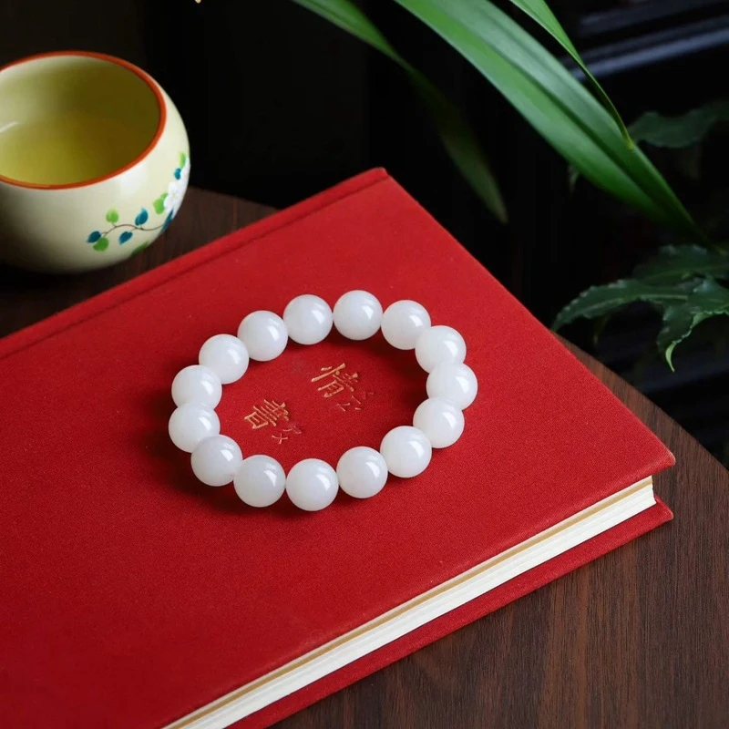 

Natural Hotan Qinghai Material Sheep Fat Grade White 14mm Round Bead Jade Bracelet