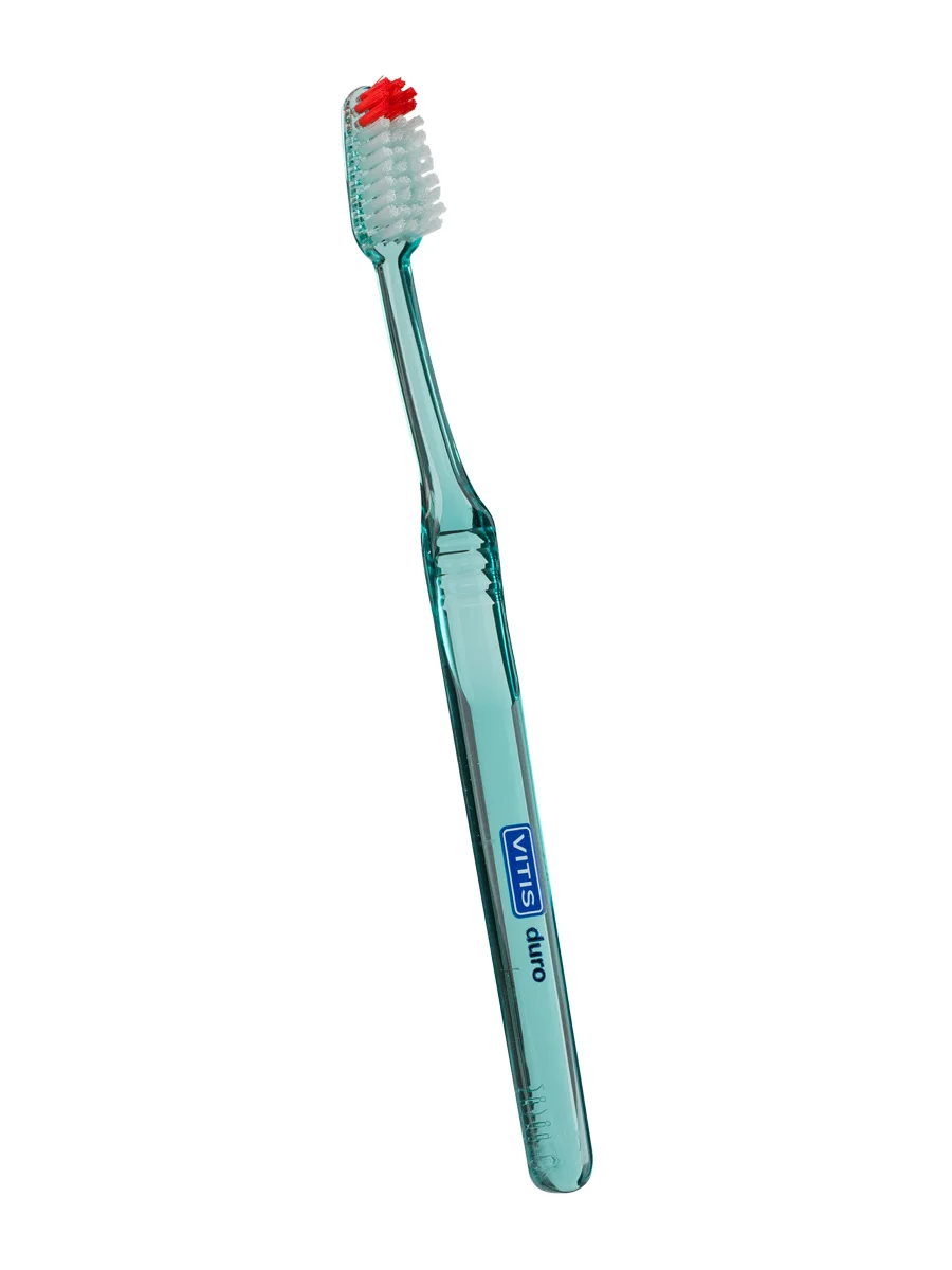 Vitis toothbrush hard-wavy profile for cleaning interdental spaces