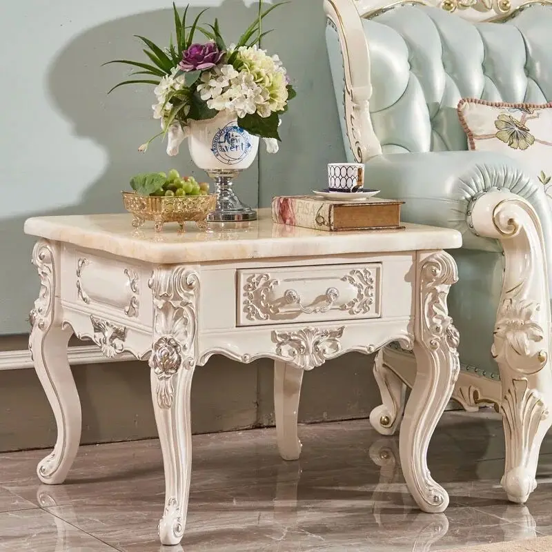 

Marble corner, carved solid wood, sofa and small coffee table in the living room.