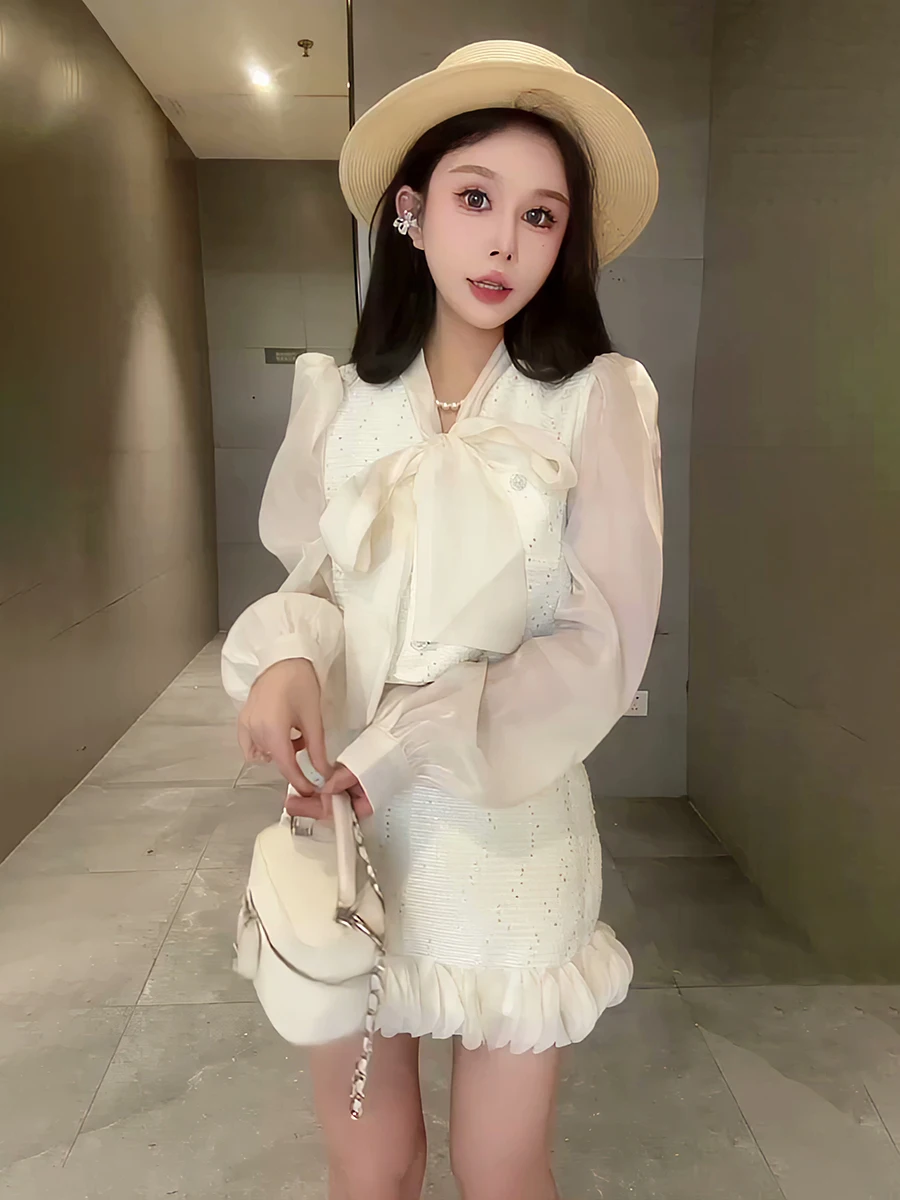 

Модный омолаживающий комплект из двух предметов: топ с длинным рукавом и юбка Ele Knot для женщин, весна 2025