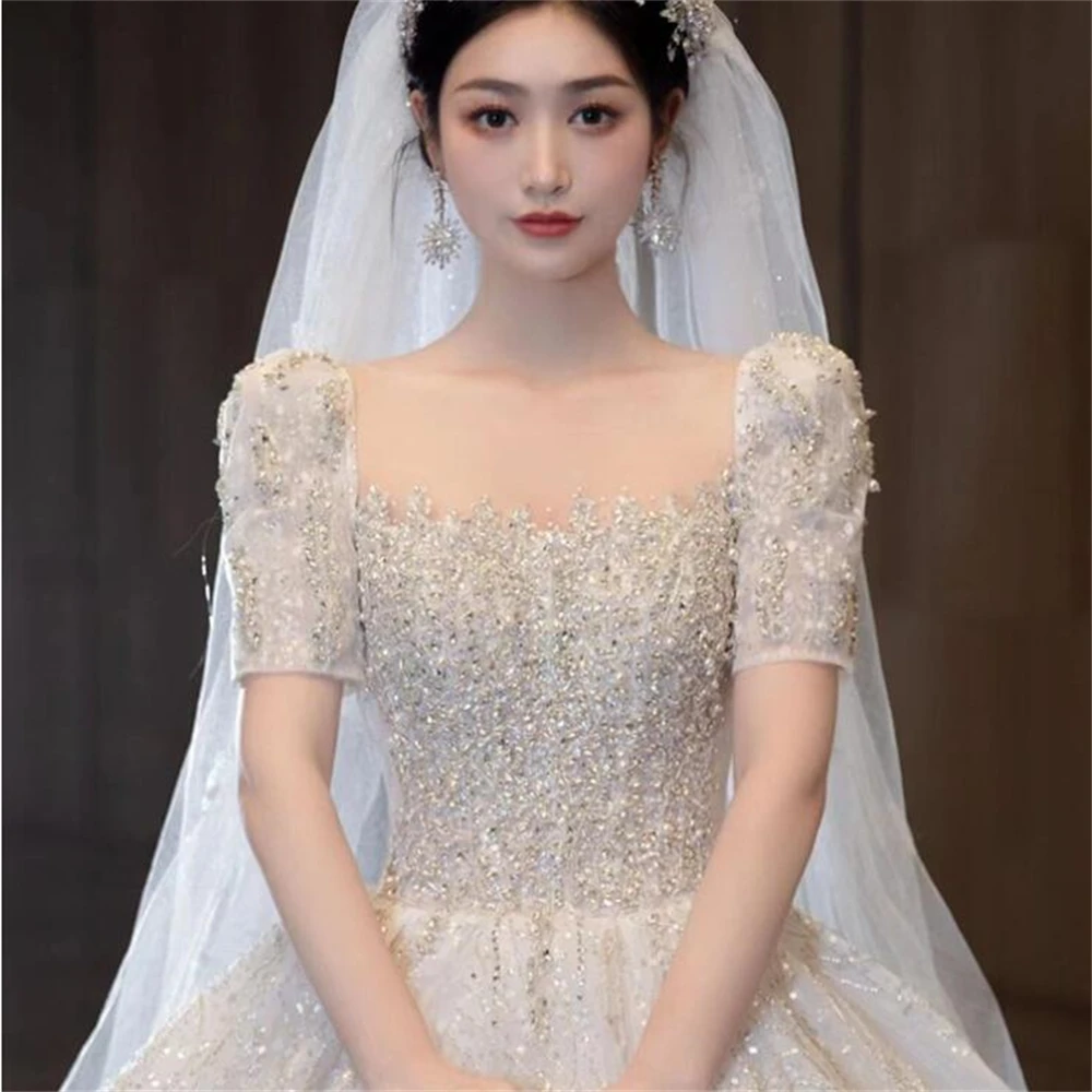 4046 New Arrival Short Sleeve Wedding Bridal Gown Embroidery Lace Appliques Ball Gown Wedding Dress 2024