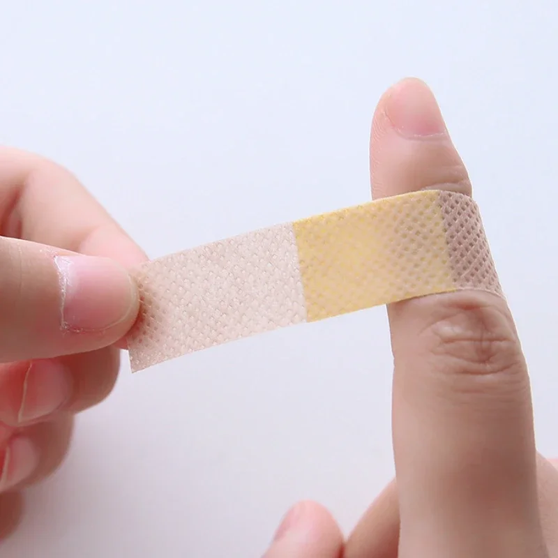 100 ชิ้นยืดหยุ่นแผลกาวพลาสเตอร์ Breathable Skin Medical Band Aid First Aid Home Travel Outdoor Camp ชุดฉุกเฉิน