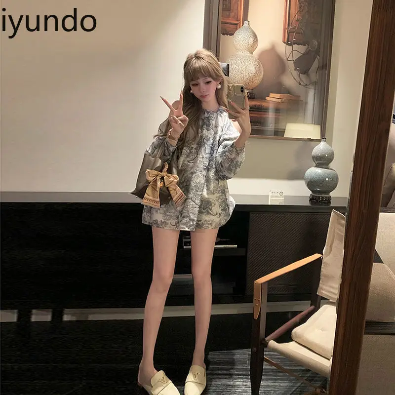 Blouse met vintage inktwasprint Losvallende off-shoulder zomertop met artistiek ontwerp Elegant veelzijdig zoet en pittig flair