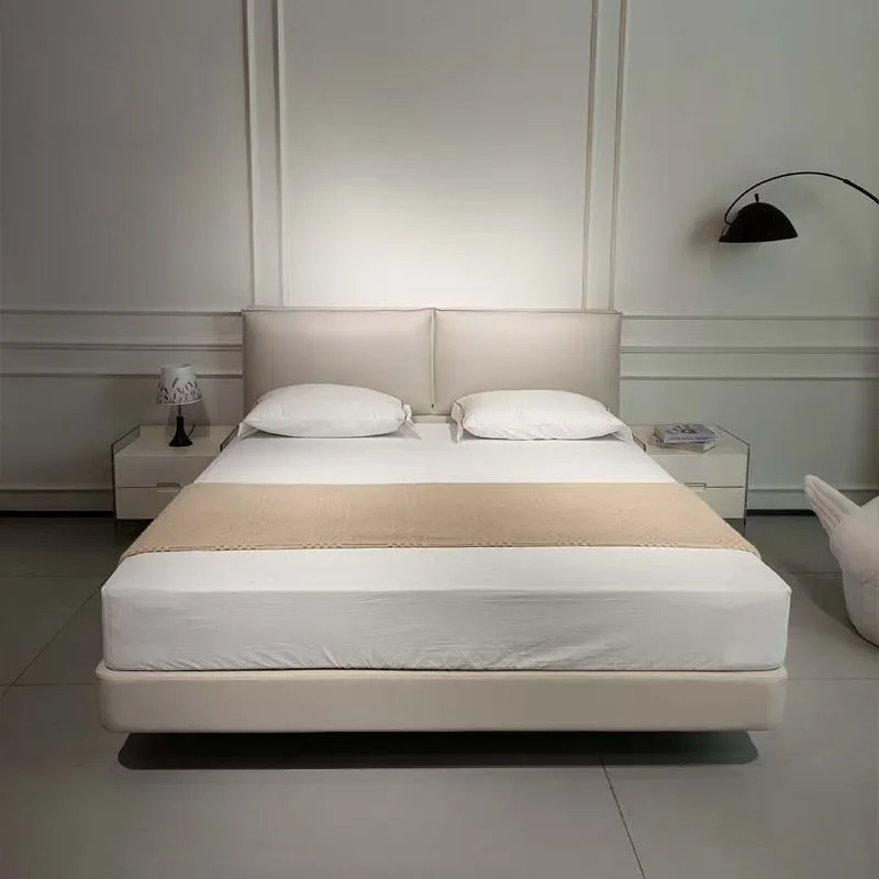 

Tofu block leather bed modern simple light luxury husband and wife master bedroom bed suspended Italian minimalist soft