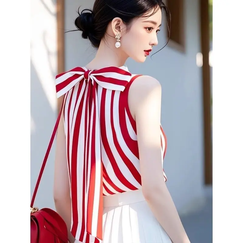 Blus tanpa lengan cantik Korea, pakaian Fashion blus temperamen yang indah, balutan pita, kemeja tanpa lengan bergaris merah musim panas untuk wanita