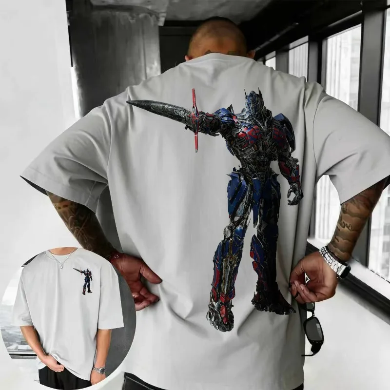 

2025-26 Summer Transformers Graphic 100% Cotton Printed T-shirt for Men Hasbro Brand Children and Unisex Breathable Loose Casual