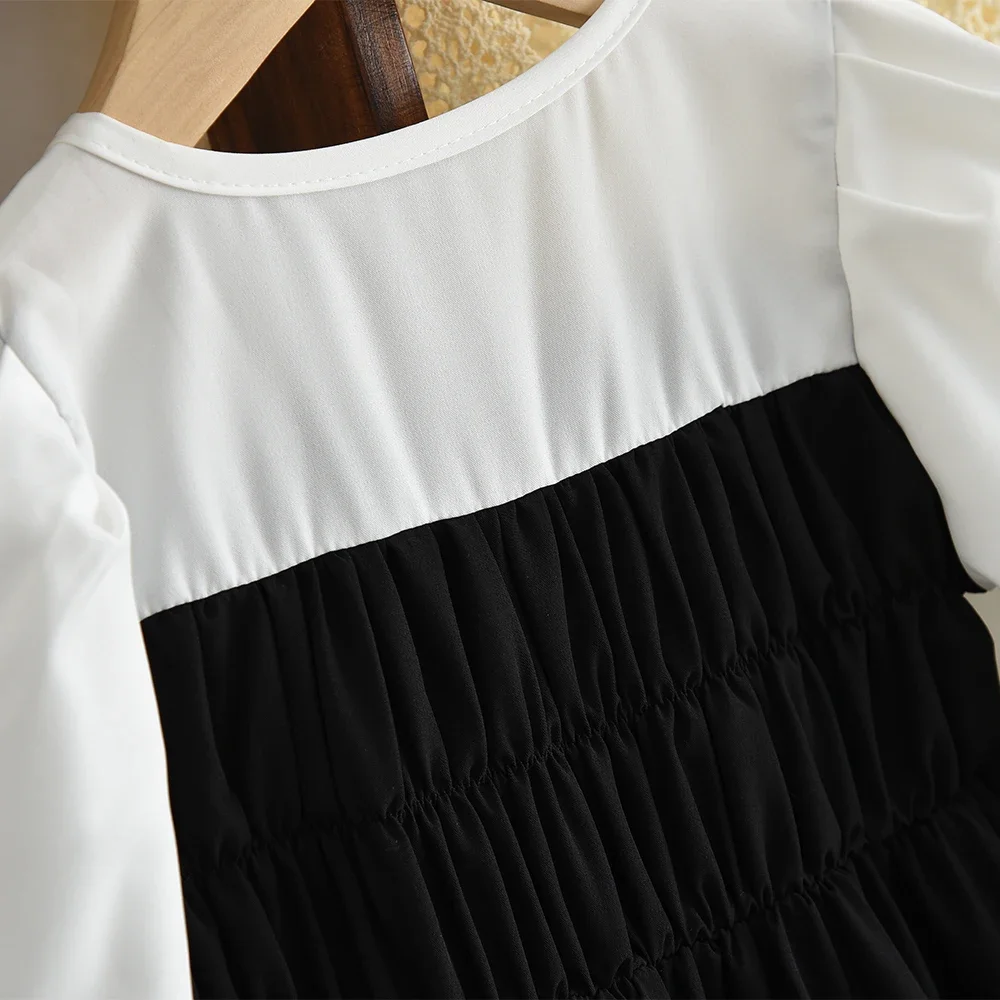 ชุดเดรสลำลองเด็กผู้หญิง สไตล์มินิมอล สีดำขาว สำหรับเด็กอายุ 3-7 ปี รุ่นใหม่ประจำฤดูใบไม้ร่วง ดีไซน์ตัดสี แต่งโบว์ แฟชั่นทันสมัย