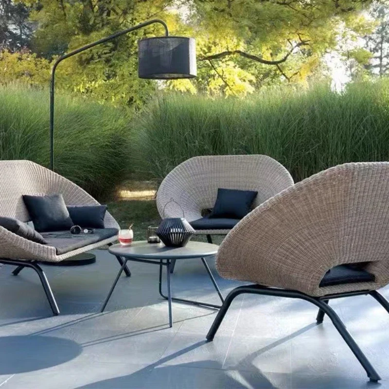 

Outdoor sofa rattan chair courtyard garden terrace waterproof and sunscreen balcony casual rattan sofa coffee table combination