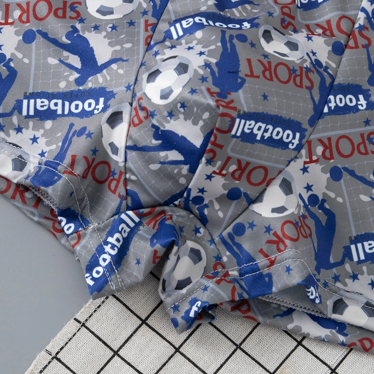 8/4-teiliges Set niedlicher Fußball-bedruckter Unterwäsche für Kinder, weiche und bequeme Boxershorts für Jungen, lässige Basic-Shorts für Zuhause – Detail 12