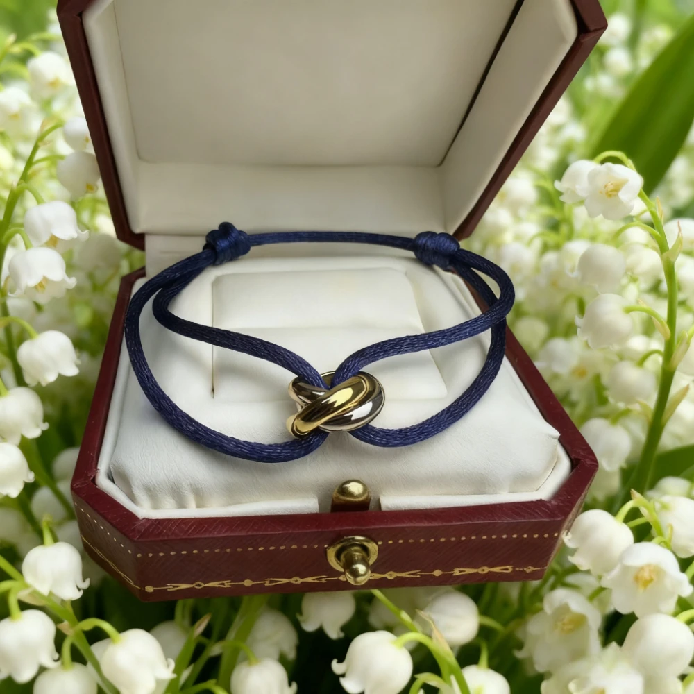 

2025 trendy accessories 18K - Gold - plated Three - ring Winding Three - color Lucky Bracelet, an Exquisite Couple Gift