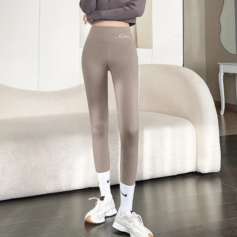 Leggings caldi da donna Leggings invernali in Cashmere di agnello a vita alta Butt Lift Slim collant di moda in velluto spesso pantaloni elastici in