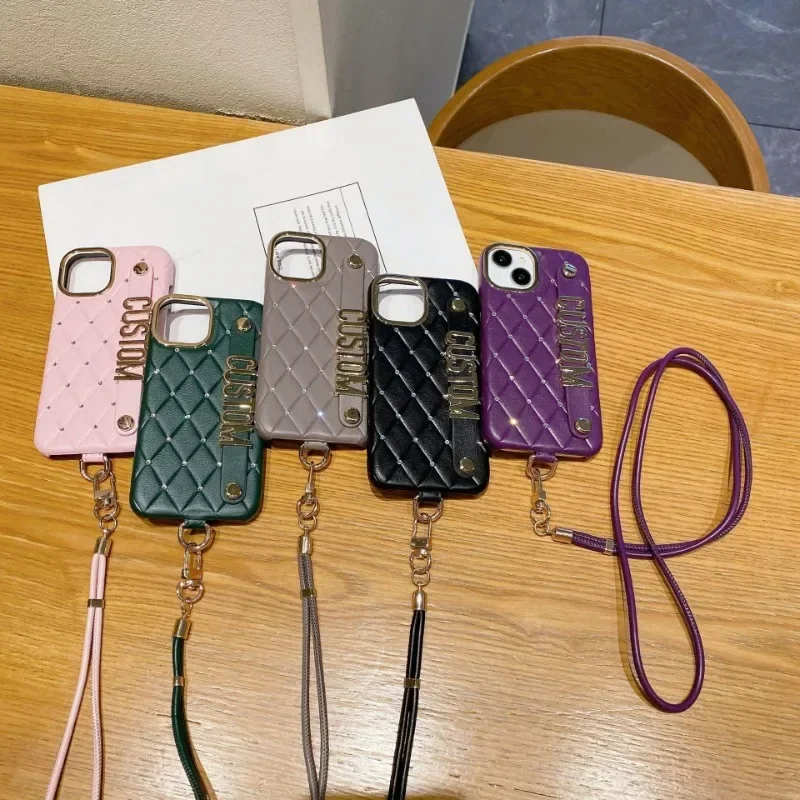 

New Customized Pu Diamond Phone Case for IPhone16 15 14 13 12Promax Series Name Letter Wristband Stand Crossbody Lanyard Cover