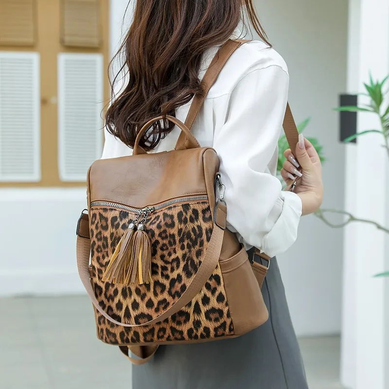 Mochilas de moda de PU con cremallera, diseño de estampado de leopardo de gran capacidad, bolsos de bolsillo con cremallera Interior de alta calidad 2025 para mujer
