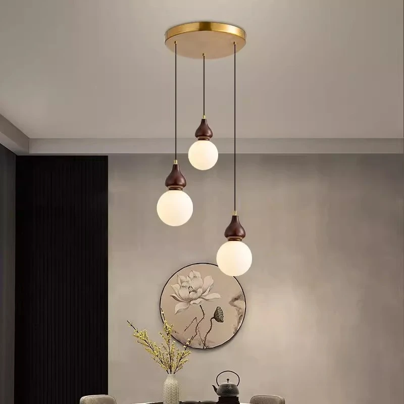 

New Chinese style solid wood chandelier three-headed restaurant tea room wall lamp Chinese style villa rotating staircase duplex