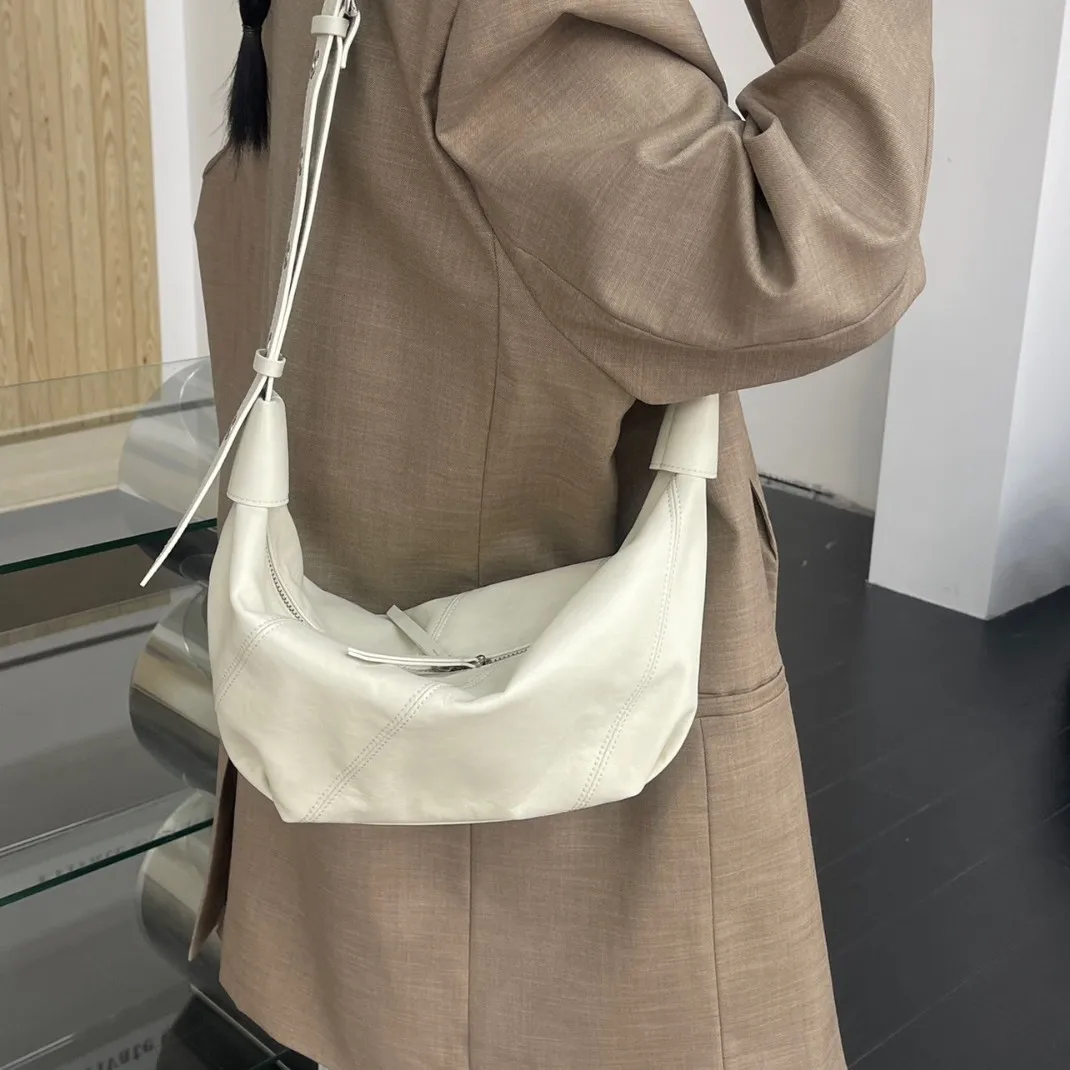 

2026 New High-end Croissant Small Cowhide Niche Dumpling Bag Autumn and Winter Shoulder Crossbody Breast Bag