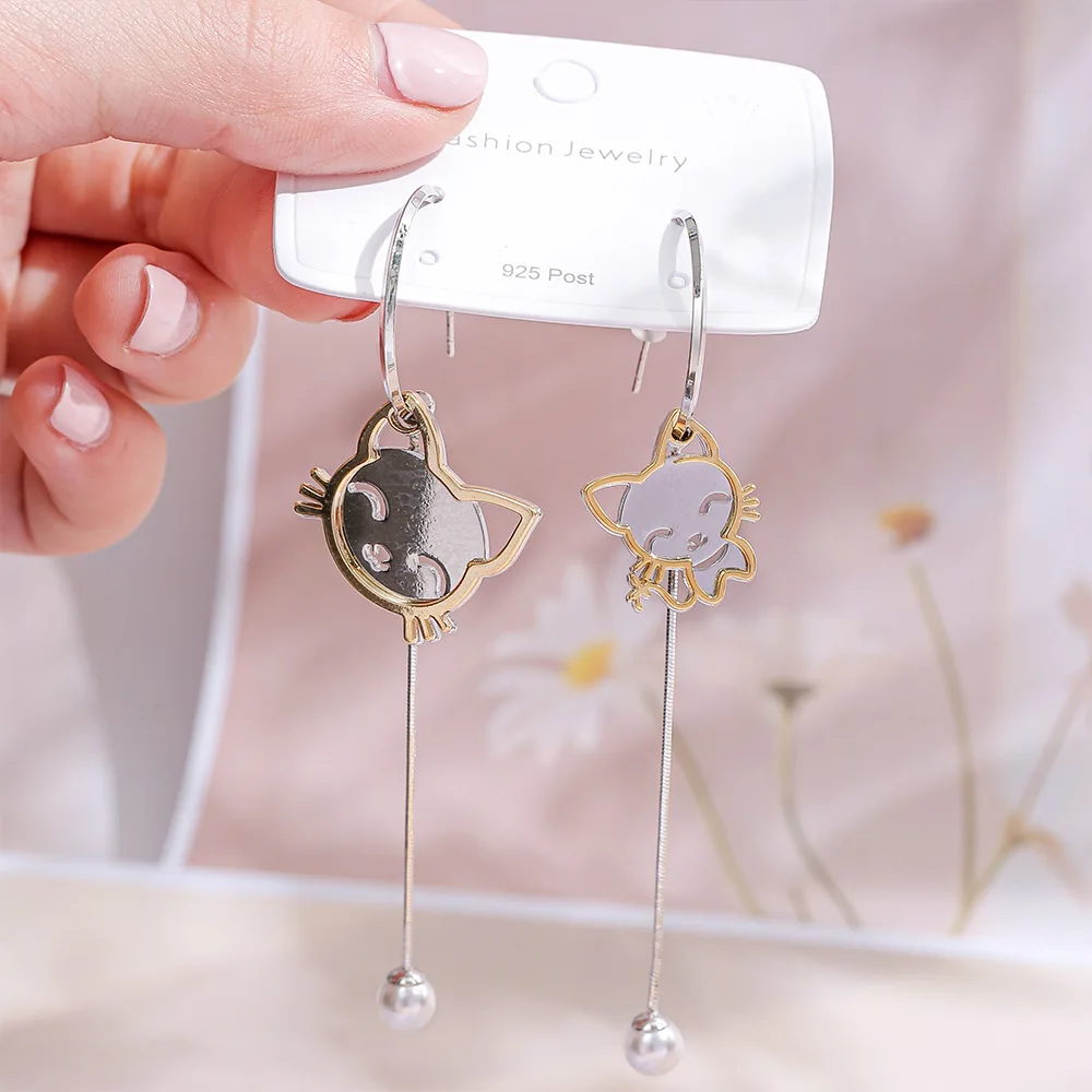 

Fashionable temperament asymmetrical earrings niche cartoon cat C-shaped one-piece silver needle earrings high-end earrings