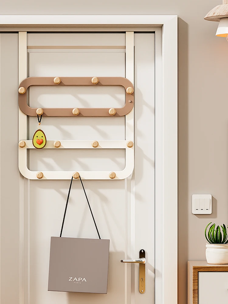 

No punching on the hook behind the door, hangers hangers on the door, hangs clothes on the wall, hats, hangers on the wall