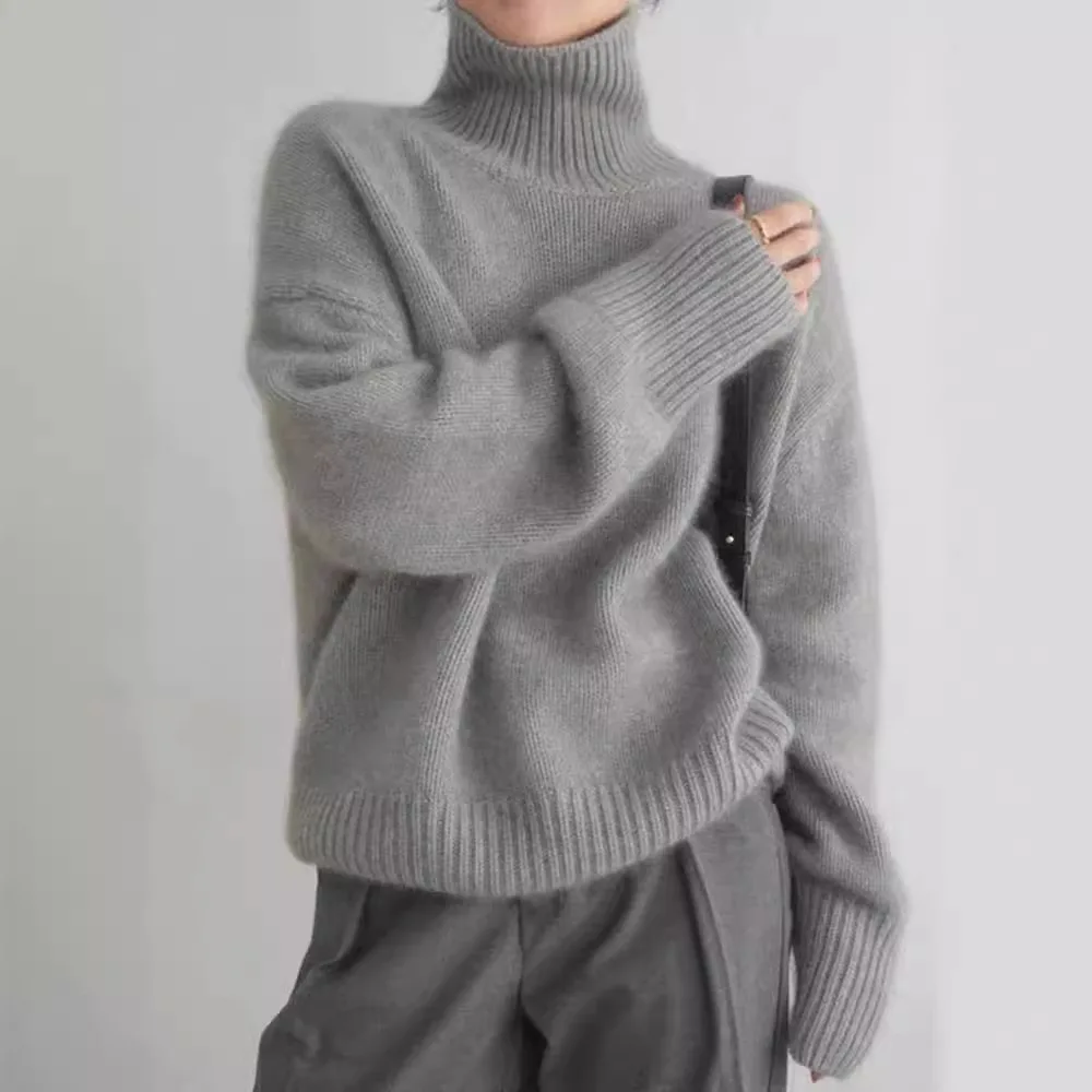 

Women's Solid Color High Neck Long Sleeved Pullover Sweater Warm Fashionable Casual Loose Knit Sweater Spring Autumn New 2026