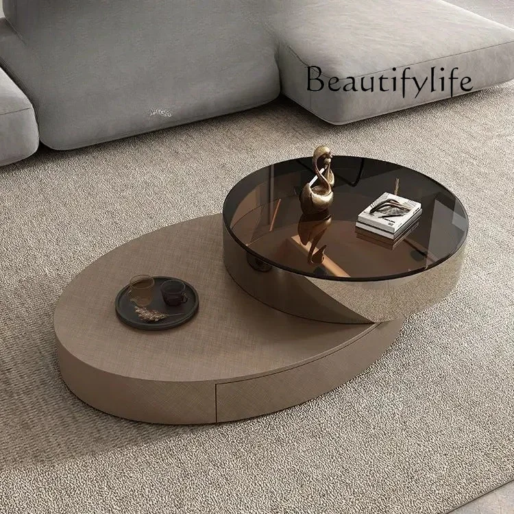 

NB Italian oval stainless steel rotating coffee table modern simple designer light luxury glass coffee table TV cabinet combinat