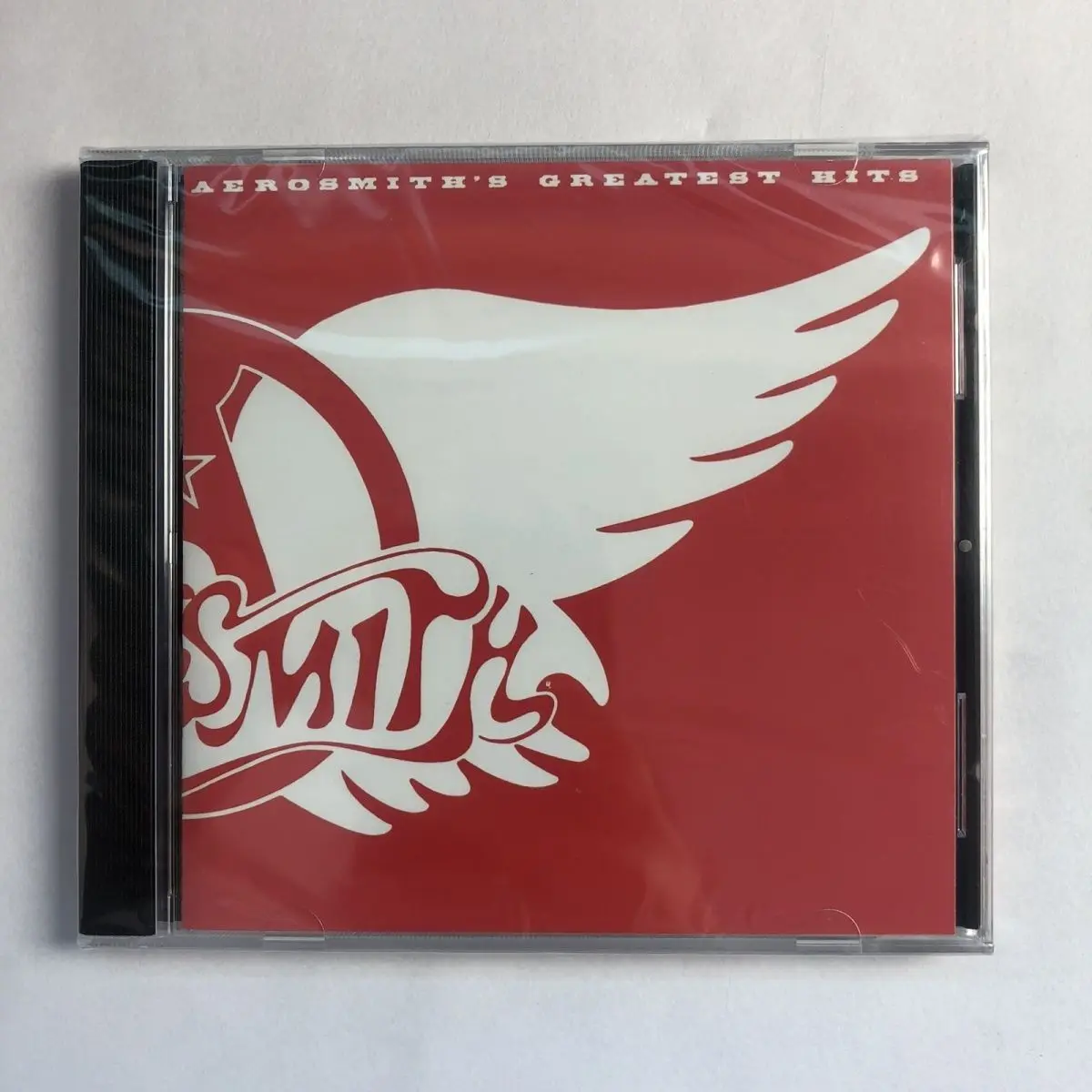 Hard Rock Aerosmith Tom Hamilton CD de música álbum de éxitos más grandes caminan en esta manera registro de música Cosplay Walkman coche tránsito sonoro caja regalo