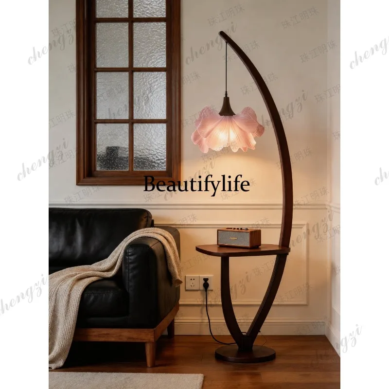 Floor-to-ceiling French antique style living room sofa decorated with pink flowers