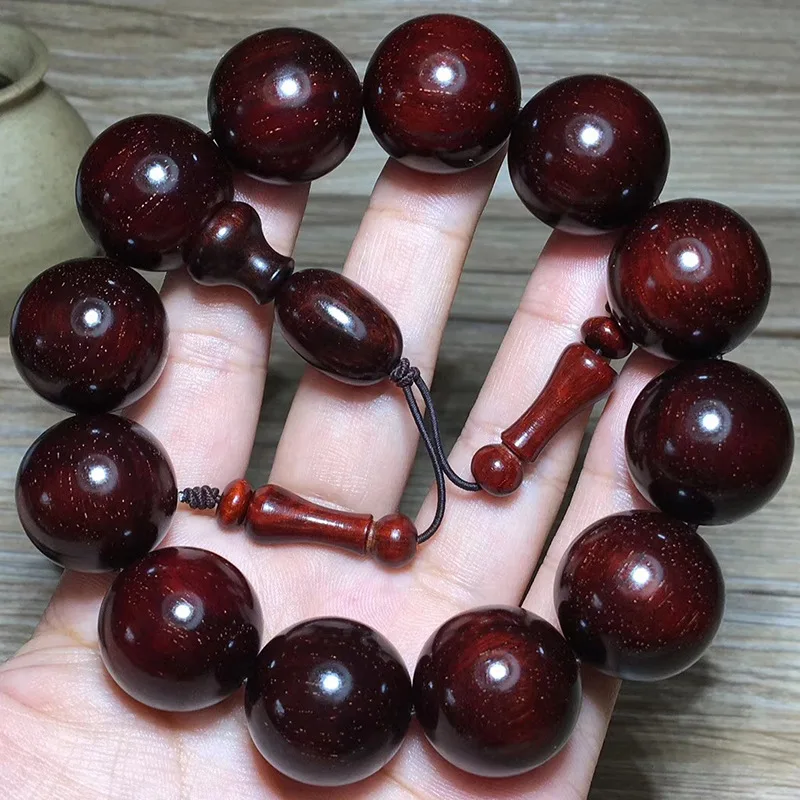 

Small-leaf rosewood 2.0*12 beads with nearly full golden inclusions, clay material, glass-backed Buddhist prayer beads bracelet