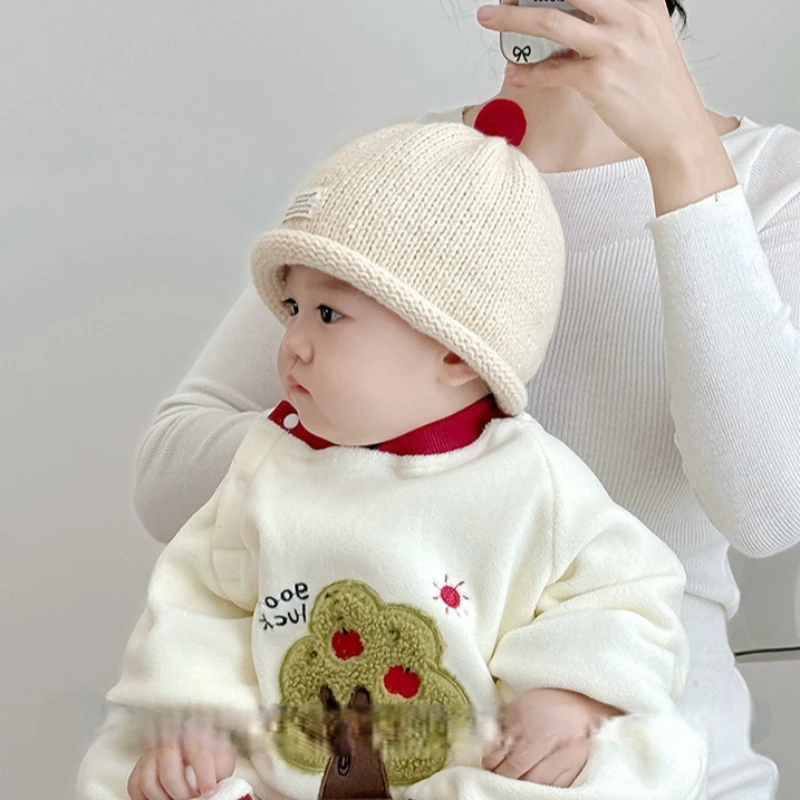 Winterwarme Baby-Strickmütze mit niedlichem Pompon, Säuglings-Beanie-Mütze, koreanische Mode, einfarbige Wollmützen für Jungen und Mädchen. – Detail 5