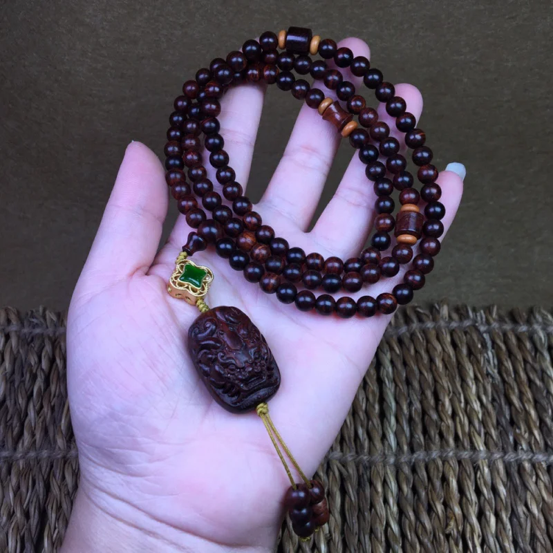 

Женский деревянный браслет Hainan Huanghuali с 108 бусинами, креативный дизайн, ручная работа из древесины фиолетового масляного грушевого дерева.