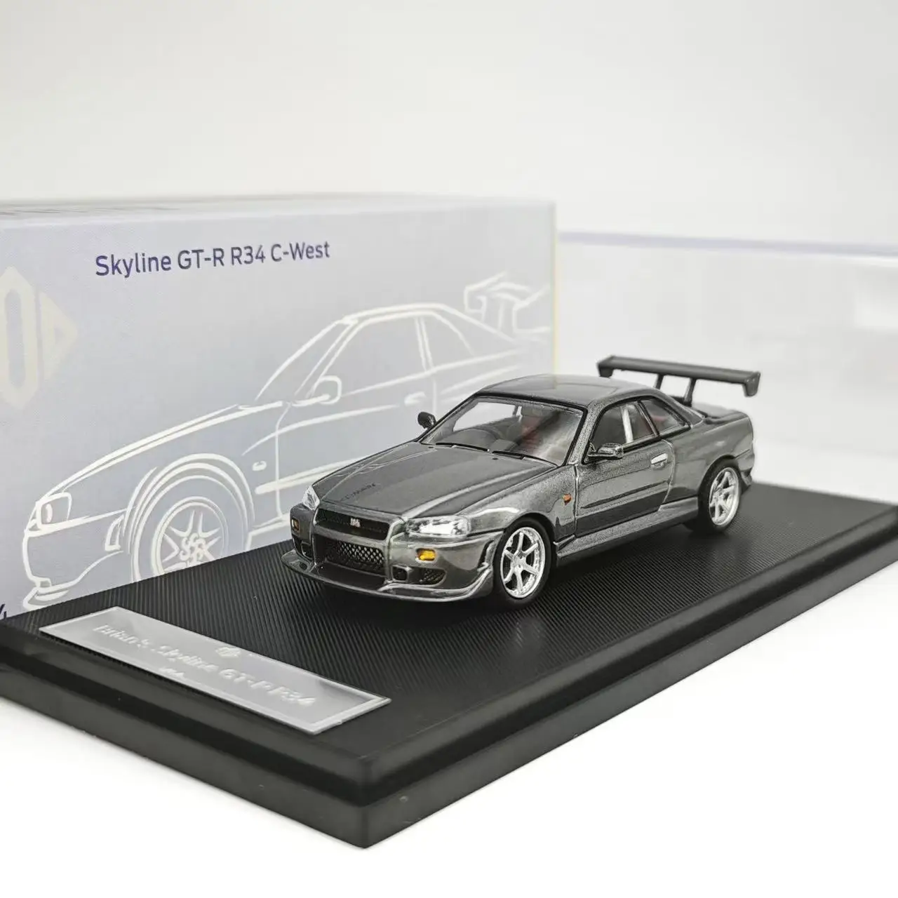 

Модель легкосплавного автомобиля KOD GFCC 1:64 R34 C-West