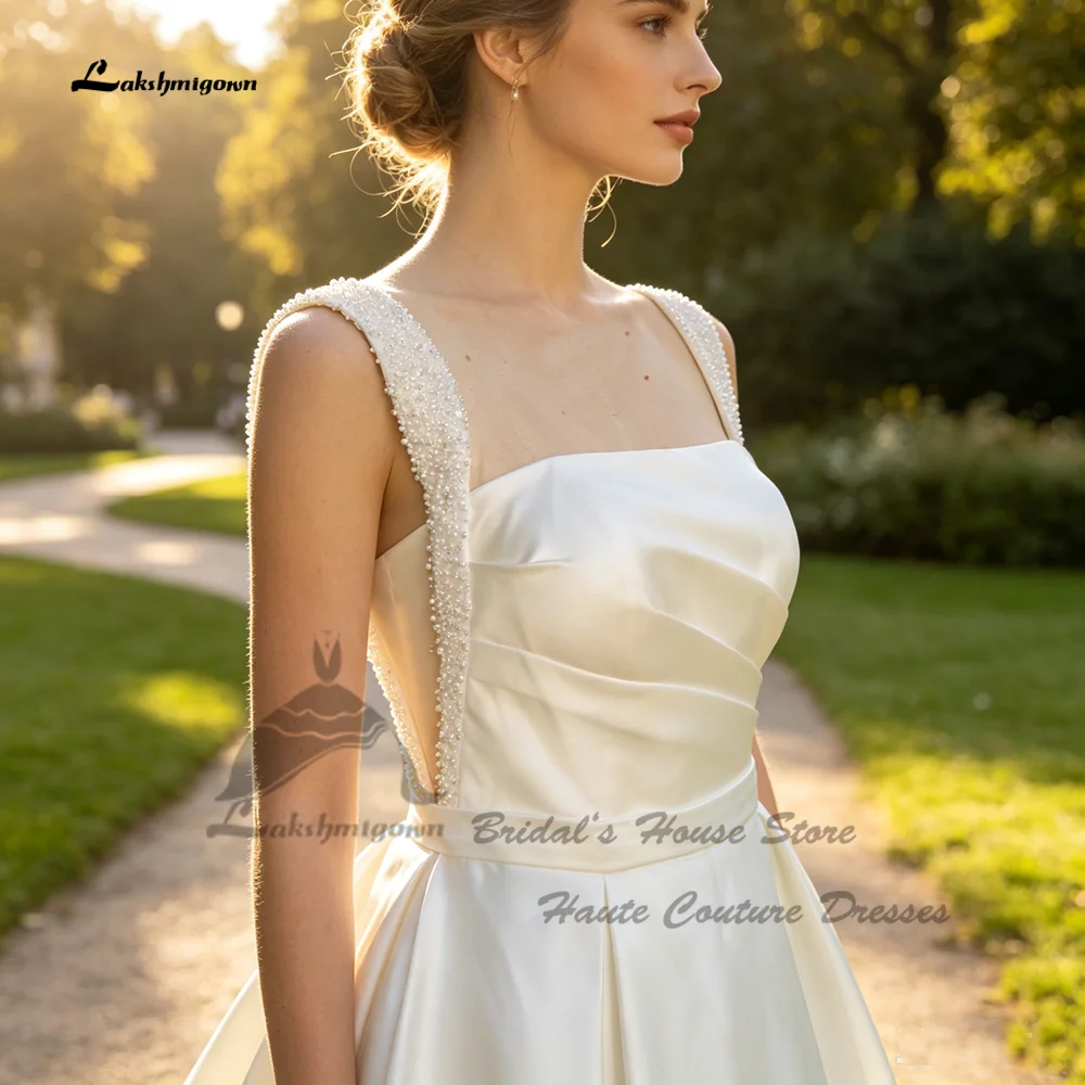 Lakshmigown Bescheidenes Satin-Hochzeitskleid für die Braut 2027 Quadratischer Ausschnitt A-Linie Weiße Brautkleider mit Perlen und Spaghettiträgern Maßanfertigung – Detail 5