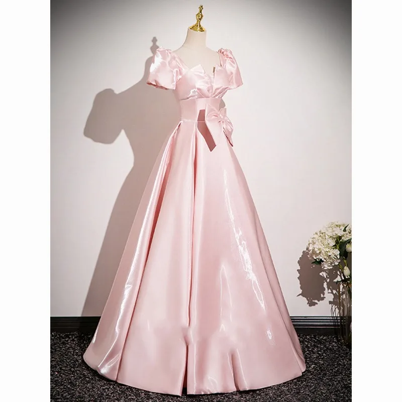 2025 New Women's Pink Satin Dress Fashionable, Slim and Elegant Annual Meeting Bow Decoration Long Back Strap Dress