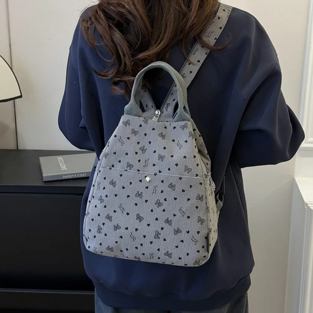

2026 New Bag Printing Large-capacity Backpack Self-feeling Lightweight Niche Student Schoolbag Multi-function Practical
