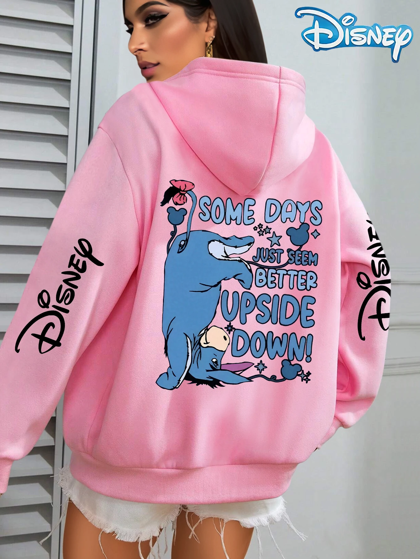 Felpa con cappuccio unisex in pile di cotone Disney Upside Down Donkey bianca con fiore rosa sulla manica della coda Design con scritte Vestibilità ampia