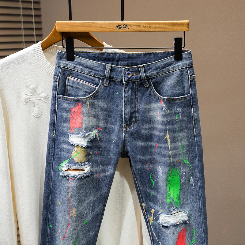 2024 New light luxury Blue MEN'S jeans fashion hole patches tide elastic slim embroidery spray paint straight casual denim pants