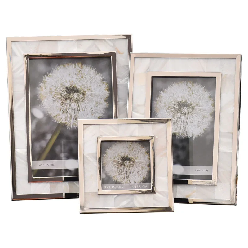 

Light luxury creative simplicity, metal shell photo frame to set the table, wash photos and print wedding photos