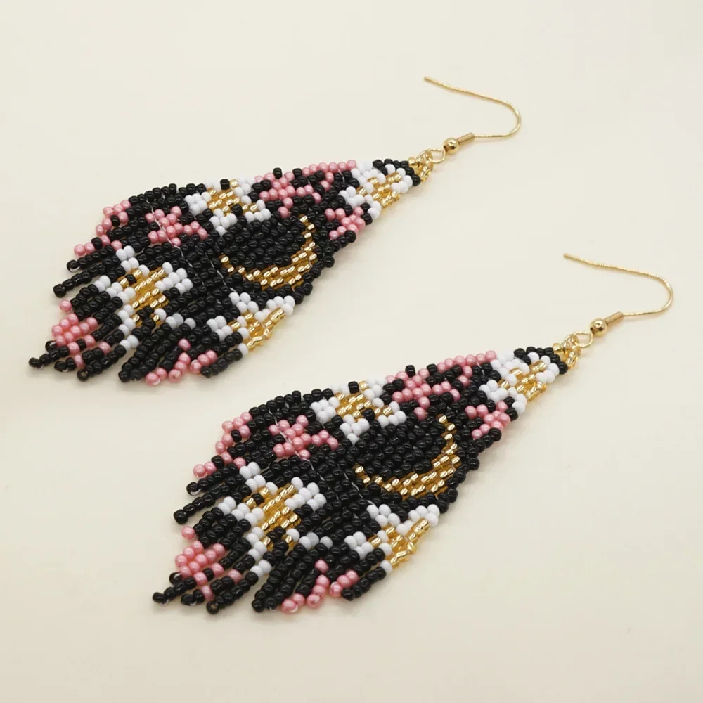 

Beaded earrings Tassel Originality Moon Astral Design Hand knitting Bohemia Alloy Tide Retro Female Simple Rice bead earrings