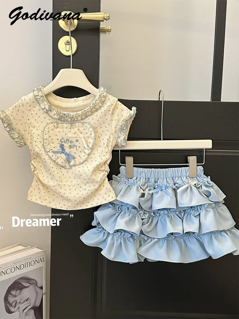 

Girls Ruffle Trimmed Short Sleeve T-shirt 2026 New Summer Fashion Cake Skirt Sweet Cute Korean Floral Little Girls Two Piece Set