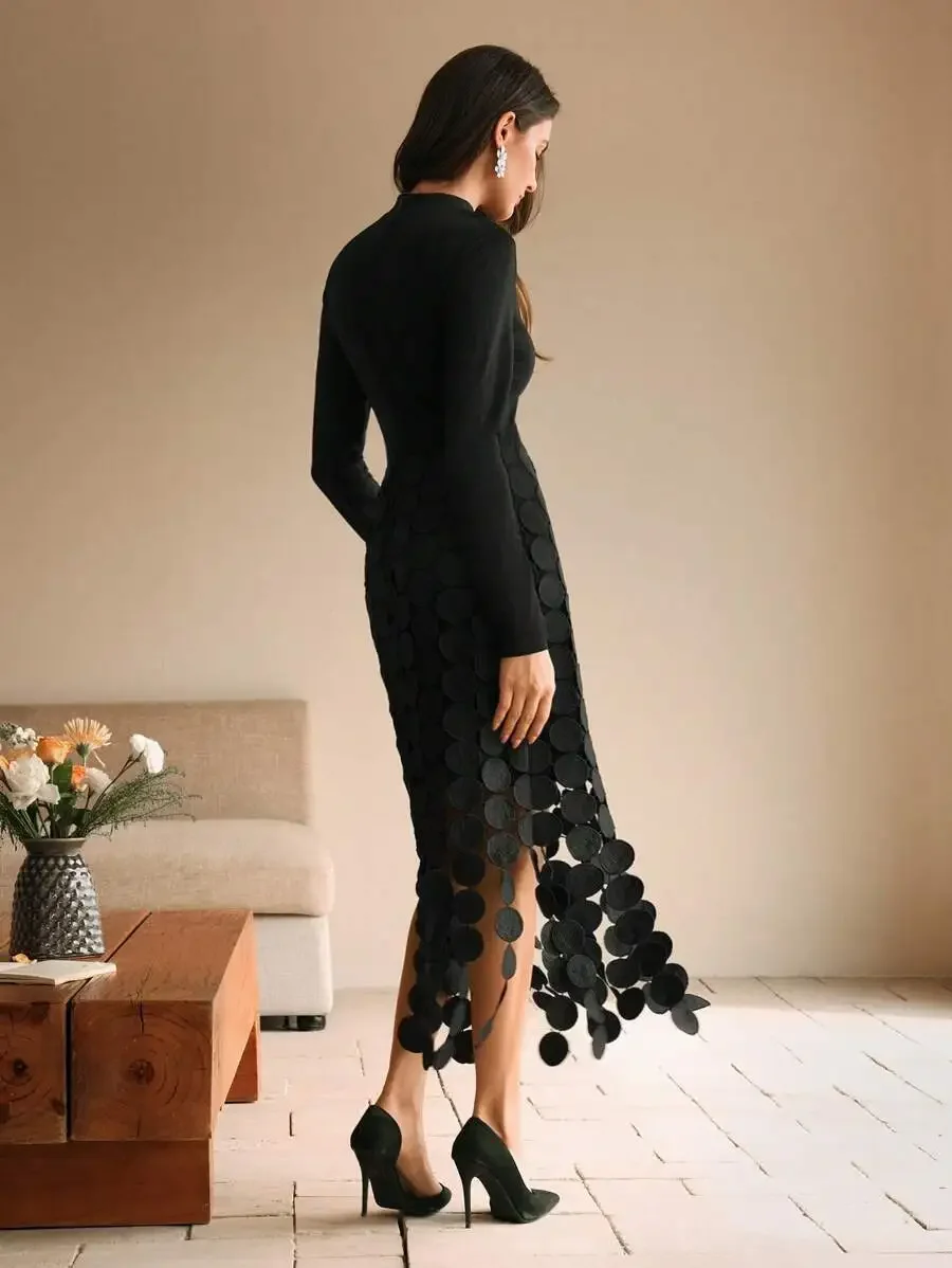 

Black Long Sleeve Mock Neck Knit Midi Dress With Asymmetrical Cascading Circular Disc Skirt Overlay